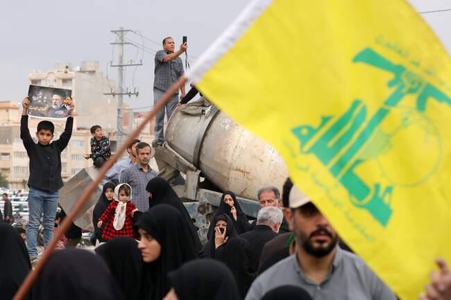 پیکر رئیس جمهور شهید در قم تشییع شد